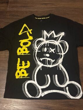 Black Graphic Tee with Yellow "BE BOLD" Text